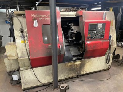 an image of a machine that is sitting in a garage