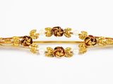 paire de barrettes couleur or ornées de fleurs et de perles