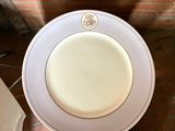 two plates and a knife sitting on a table