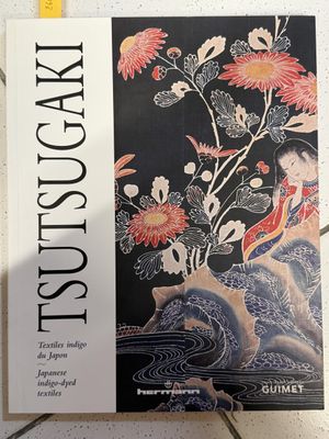 an image of a book with a picture of a woman in a kimono dress