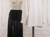 two mannequins that are on display in a room