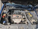 a car with its hood open and the engine in the trunk
