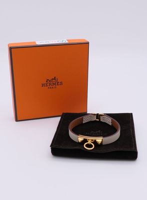hermes zodiac bracelet in black and gold