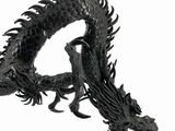 a black dragon statue on a white background