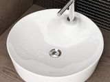 a white sink sitting on a wooden counter in a bathroom