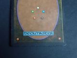 a picture of a deck master card on a table