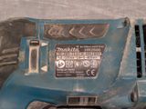 a close up view of a corded electric tool