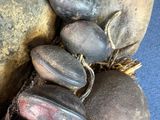 a pile of rocks sitting on top of a blue surface