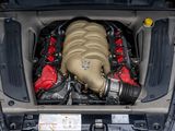 a car engine with the hood open and the engine in the trunk