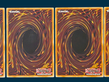 three cards with a picture of a spiral design on them