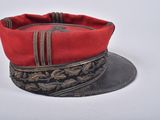 a red hat with a black band on it