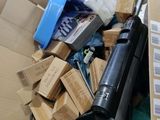 a cardboard box filled with assorted items in it