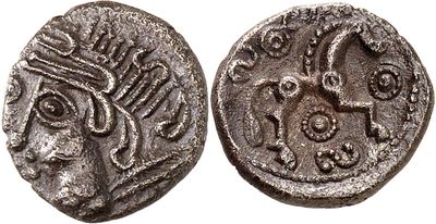 a silver coin with an image of a man on it