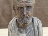 bust of an old man with a beard and a bearding