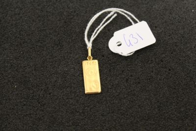 a close up of a tag on a black surface with a tag attached to it