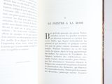 an open book with a picture of a cat on the page