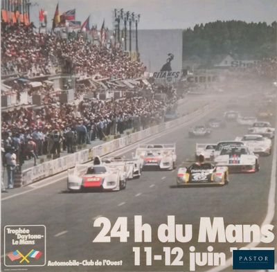 a poster of a race with cars going down the track