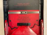 a red and black box that has a black and red label on it