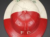 an old red and white baseball hat with the word f d painted on it