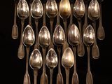 many spoons arranged in the shape of a heart