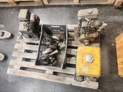 many different types of engines on a pallet