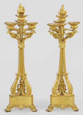 pair of antique brass candlesticks with floral decoration