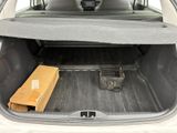 a trunk of a car with a box in the back