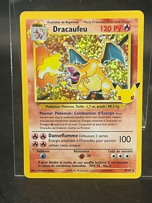a picture of a pokemon card with a dragon on it
