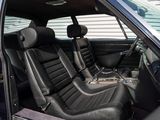 a picture of the inside of a car with black leather seats