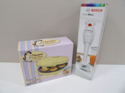packaging for a cake making machine and a boxed box on a table