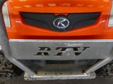 a close up of the front bumper of an orange truck