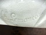a close up view of a toilet with a paper towel on it
