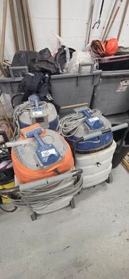 many suitcases that are sitting in a room