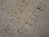a close up of the writing on the wall of a building