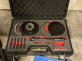 a tool kit that is sitting on the floor