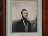 portrait of a man in a black coat and white shirt