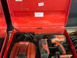 a red tool box with tools inside of it