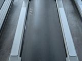three treads that are on the floor in the room
