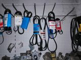 many tools hanging on a pegboard in a garage
