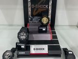 three casio g shock watches are on display in a display case