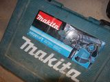 a blue tool case with a tool in it