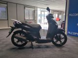 a scooter that is parked inside of a building