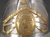 a close up of a helmet with a crest on it