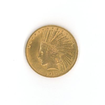 une pièce d'or sur laquelle est représentée une tête d'Indien