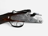 a close up of a gun on a white background