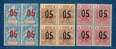 a close up of four different stamps with numbers on them