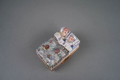 a small book that has a picture of a woman on it