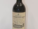 a bottle of wine that is sitting on a table