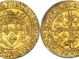 a gold coin with a crown on the front and a shield on the back