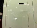 a white van with a sticker on the side of it